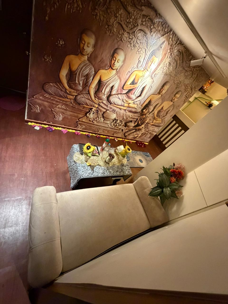 Buddha mural and lounge seating